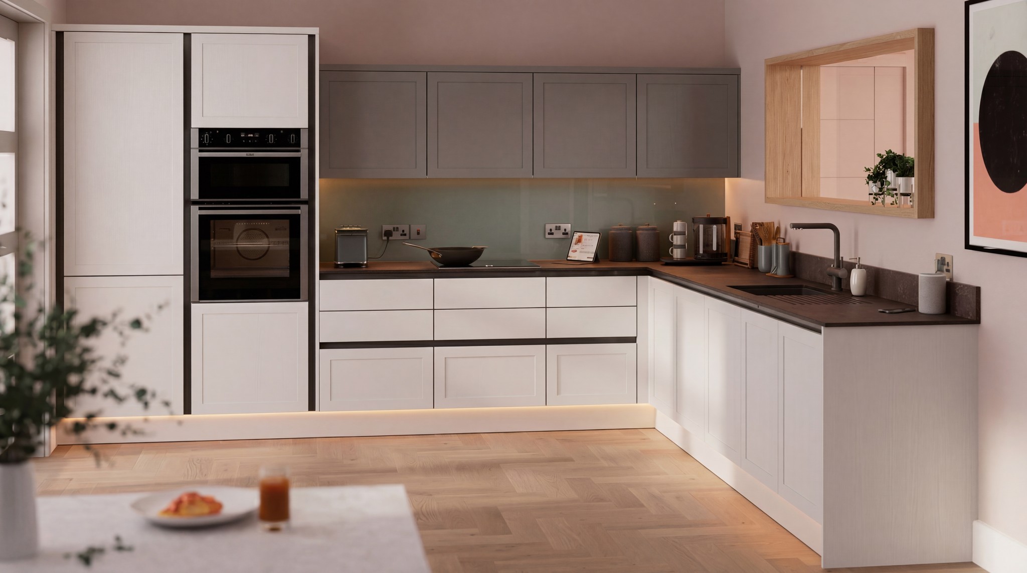 Modern kitchen with handleless white and grey cabinets and LED strip lighting