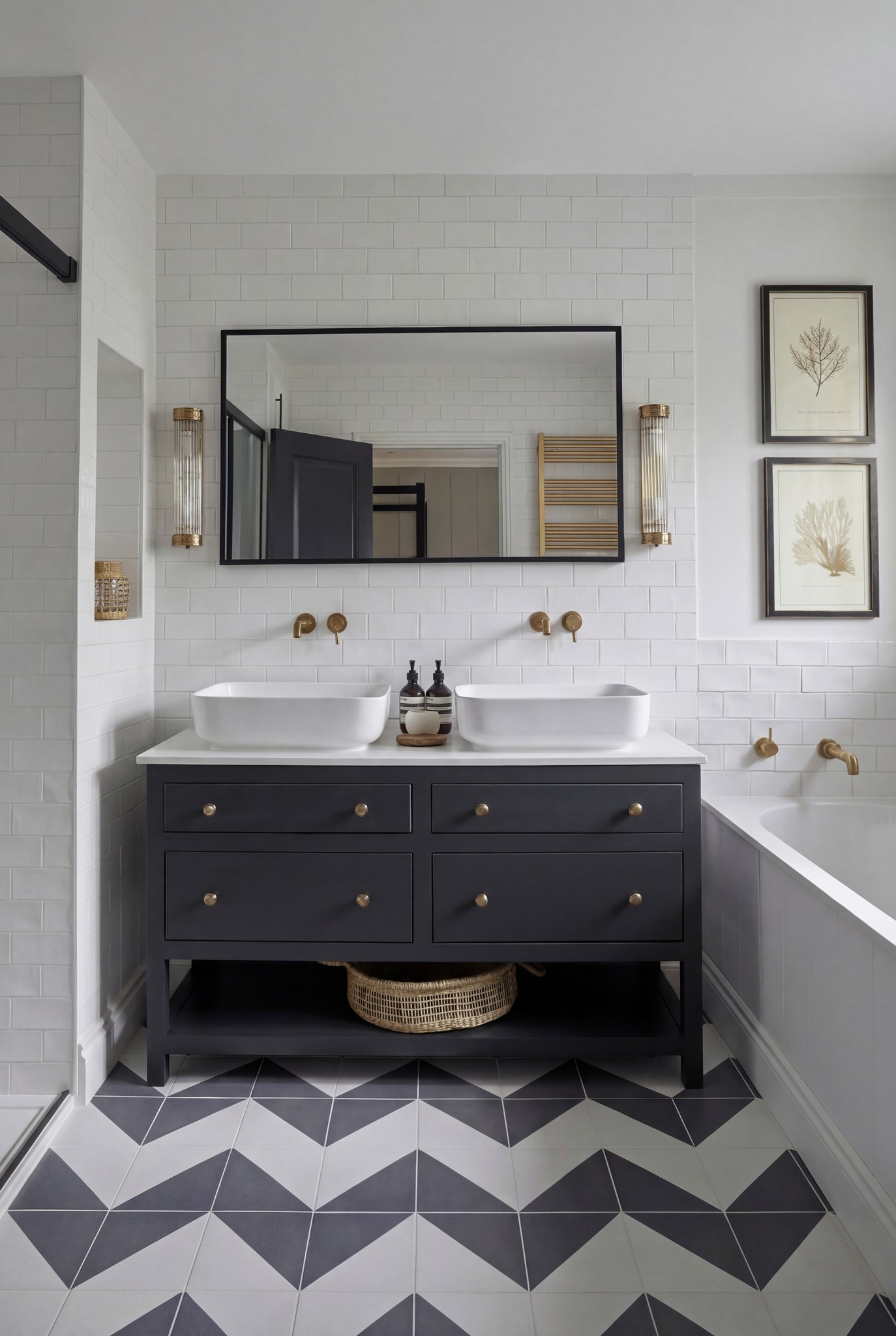 Bathroom with a charcoal double vanity, black-framed mirror and chevron floor tiles